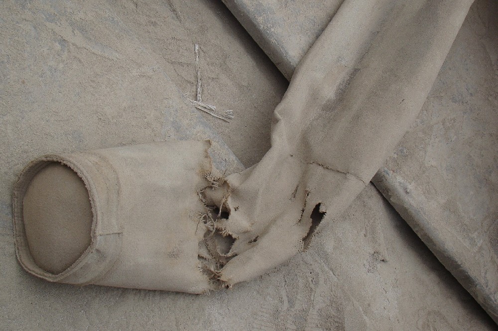 如何處理破損的除塵布袋？